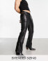 ASOS DESIGN bootcut trousers in leather look with cut out sides in black - BLACK