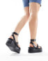 ASOS DESIGN Wide Fit Trombone chunky buckle detail flatforms in black