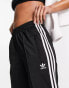 adidas Originals Firebird joggers in black