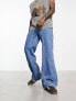 ASOS DESIGN wide flare jeans in mid blue wash