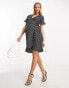 Vero Moda Maternity wrap mini dress in black spot print