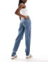 ASOS DESIGN high rise relaxed mom jeans with rips in mid blue