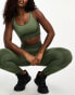 Hummel Seamless mesh insert sports crop top in dark green