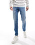 ASOS DESIGN slim jeans in mid wash blue