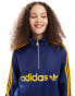 adidas Originals woven jacket in navy and orange