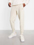 Puma essentials small logo joggers in off white