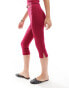 ASOS DESIGN mid rise capri leggings in wine