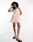 ASOS DESIGN bow bust shirred waist mini sundress in pink ditsy print