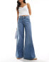 Vero Moda extreme wide leg jeans in medium blue wash