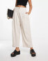 ASOS DESIGN pleated tapered trousers with linen in stone