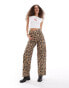 COLLUSION X015 baggy jeans in washed leopard print