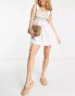 River Island embroidered shirred mini beach dress in white