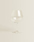 Raised crystalline wine glass