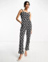 Never Fully Dressed – Jumpsuit mit schwarz-weißem Print und Lochmuster