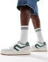 Levi's Glide L chunky trainers with patch logo in white and green