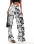 ASOS DESIGN wide leg satin twill trousers in distorted animal print