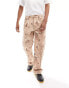 Guess Originals relaxed fit denim jeans in beige with all over cowboy print