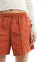 Nike Woven shorts in orange