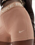 Nike Training Pro 365 3 inch leakproof legging shorts in light brown