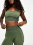 Hummel Seamless mesh insert sports crop top in dark green