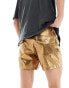 ASOS DESIGN slim short in gold metallic