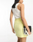 ASOS DESIGN wrap mini skirt with linen in yellow