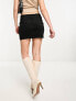 Weekday minimal scuba mini skirt in black