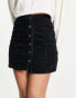 DTT Jordan cord button front mini skirt in black