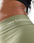 New Balance Linear Logo sleek 25 inch high rise leggings in olive green