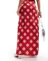 The Frolic check print satin midaxi skirt in red and pink