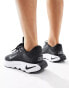 Nike Training Motiva trainers in black and white