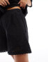 ASOS DESIGN – Hochwertige Shorts in Schwarz mit Lochmuster, Kombiteil