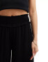 ASOS DESIGN shirred waist wide leg trouser in black