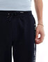 Tommy Hilfiger logo joggers in navy