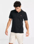 Levi's polo shirt in black with small logo