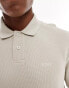 BOSS Orange petempestolong polo shirt in light beige