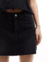 COLLUSION denim cut off mini skirt in washed black