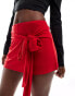 ASOS DESIGN slinky flippy skort with front tie detail in red