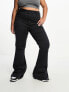 ASOS DESIGN Curve power stretch flared jeans in black