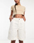 ASOS DESIGN longline cargo short with contrast stitch in white