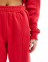 Murci exclusive saint motif joggers co-ord in red