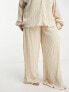 In The Style Plus plisse relaxed trouser co-ord in cream