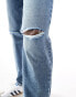 ASOS DESIGN high rise relaxed mom jeans with rips in mid blue