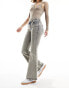 Monki Katsumi low rise flared leg jeans in beige tint