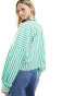 ASOS DESIGN spliced detail volume shoulder shirt in green stripe