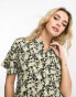 ASOS DESIGN button front tiered smock playsuit in grungy floral