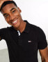 Tommy Jeans slim placket short sleeve polo shirt in black