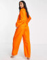 ASOS DESIGN Petite exclusive modal shirt & trouser pyjama set with contrast piping in orange