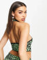 Motel knitted halter neck crop top in green warped polka co-ord