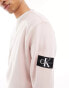 Calvin Klein Jeans badge crew neck sweatshirt in sepia rose